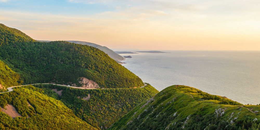 Aerial view of winding road through Cape Breton Highlands